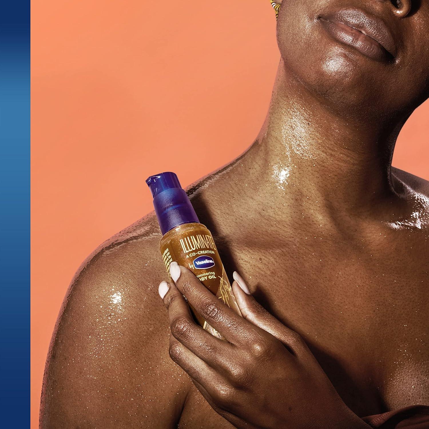 imageVaseline Illuminate Me Shimmering Body Oil Created for Melanin Rich Skin Illuminates Skin with Finishing Touch of Shimmer for Glowing Skin 33 oz33 Fl Oz Pack of 1